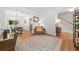 Well-lit living room with hardwood floors, transitional furniture and neutral color palette at 2711 Brookefield Nw Ln, Kennesaw, GA 30152