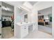 Main bathroom features dual sinks and access to the main bedroom and the walk-in closet at 2711 Brookefield Nw Ln, Kennesaw, GA 30152