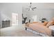Main bedroom with carpeted floors and ceiling fan at 2711 Brookefield Nw Ln, Kennesaw, GA 30152