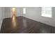 Bright and spacious bedroom showcasing a large closet and hardwood flooring at 2821 Ne Meadowlark Trail, Duluth, GA 30096