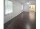 Spacious bedroom with natural light and modern flooring at 2821 Ne Meadowlark Trail, Duluth, GA 30096