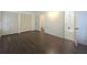 Bedroom featuring ensuite bath and closet with louvered doors at 2821 Ne Meadowlark Trail, Duluth, GA 30096
