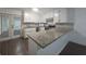 Kitchen with stainless steel appliances and a granite countertop at 2821 Ne Meadowlark Trail, Duluth, GA 30096