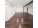 Spacious living room featuring hardwood floors and neutral walls at 2821 Ne Meadowlark Trail, Duluth, GA 30096