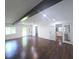 Bright living area with hardwood floors, natural light and access to the kitchen at 2821 Ne Meadowlark Trail, Duluth, GA 30096