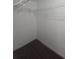 Spacious walk-in closet with modern flooring and ample storage space at 2821 Ne Meadowlark Trail, Duluth, GA 30096