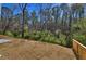 Backyard with a view of the woods and a patio at 335 Melody Ne Ln, Cartersville, GA 30121