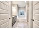 This primary bathroom features a granite double vanity and separate tub and shower at 335 Melody Ne Ln, Cartersville, GA 30121