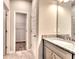 Bathroom with granite-topped vanity and tile flooring, providing a stylish and functional space at 335 Melody Ne Ln, Cartersville, GA 30121