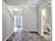 Welcoming foyer with new flooring, complemented by an adjacent powder room, enhancing the home's functionality and style at 335 Melody Ne Ln, Cartersville, GA 30121