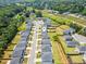 Aerial view of a residential community with green lawns and well-spaced homes at 4720 Dufour Dr, Lilburn, GA 30047