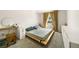 Bright bedroom with a large window and modern furnishings at 4720 Dufour Dr, Lilburn, GA 30047