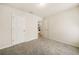 Bedroom with neutral carpet, white walls, and ample space for furniture at 4720 Dufour Dr, Lilburn, GA 30047