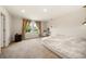Spacious bedroom features a window and a view of the neighborhood at 4720 Dufour Dr, Lilburn, GA 30047