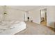 Bedroom with carpet and doorways leading to bathroom and other rooms at 4720 Dufour Dr, Lilburn, GA 30047