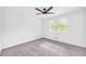 Bedroom featuring carpet, white paint, and natural light from window at 2657 John Petree Rd, Powder Springs, GA 30127
