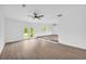 Bright living room with high ceilings, modern flooring, and abundant natural light at 2657 John Petree Rd, Powder Springs, GA 30127