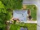Aerial view showcases the house, mature landscaping, deck, shed, patio, and well-manicured lawn at 3349 Concord Se Cir, Smyrna, GA 30080