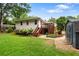 Spacious backyard with deck, storage shed, and garden area, perfect for outdoor enjoyment at 3349 Concord Se Cir, Smyrna, GA 30080