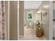Clean bathroom with a vanity sink, tiled floors, and a window for natural light at 3349 Concord Se Cir, Smyrna, GA 30080