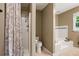 Well-lit bathroom features a separate shower, a tiled bathtub, and classic fixtures at 3349 Concord Se Cir, Smyrna, GA 30080