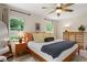 Tranquil bedroom featuring a ceiling fan, natural light, and ample closet space at 3349 Concord Se Cir, Smyrna, GA 30080
