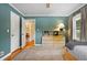 Spacious bedroom with hardwood floors, blue walls, a ceiling fan and access to another room at 3349 Concord Se Cir, Smyrna, GA 30080