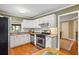 Charming kitchen features white cabinets, granite countertops, and stainless steel appliances at 3349 Concord Se Cir, Smyrna, GA 30080