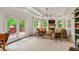 Cozy living room with fireplace, tray ceiling, and access to an outdoor deck at 3349 Concord Se Cir, Smyrna, GA 30080