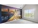 Large bedroom featuring a custom city mural and natural lighting at 3385 Amhurst Pkwy, Atlanta, GA 30349