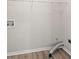 A simple laundry room with hookups and wood-look floors, ready for appliances at 3385 Amhurst Pkwy, Atlanta, GA 30349