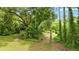 Secluded backyard space offering peaceful environment surrounded by trees at 12728 Bells Ferry Rd, Canton, GA 30114