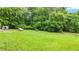 Expansive backyard featuring animal pens and a garden, perfect for outdoor activities and hobby farming at 12728 Bells Ferry Rd, Canton, GA 30114