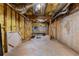 Unfinished basement featuring exposed insulation and a concrete floor at 220 Broadmoor Dr, Fayetteville, GA 30215