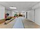 Unfinished basement space with concrete floor and drop ceiling at 220 Broadmoor Dr, Fayetteville, GA 30215