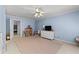 Bright bedroom with a daybed, a dresser, and a toy dollhouse at 220 Broadmoor Dr, Fayetteville, GA 30215
