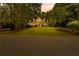 View of the home from street with large front yard at 220 Broadmoor Dr, Fayetteville, GA 30215