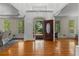 Spacious foyer with hardwood floors, high ceilings, and view of the front yard through the open door at 220 Broadmoor Dr, Fayetteville, GA 30215