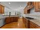Beautiful kitchen with stainless steel appliances, hardwood floors and views to the dining area at 220 Broadmoor Dr, Fayetteville, GA 30215