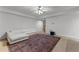 Finished basement area with plush seating and large area rug at 220 Broadmoor Dr, Fayetteville, GA 30215