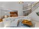 Bright living area with staircase, comfortable seating and open view to kitchen and dining area at 220 Broadmoor Dr, Fayetteville, GA 30215