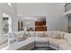 Open living space with staircase and view to the kitchen and dining area with comfortable seating at 220 Broadmoor Dr, Fayetteville, GA 30215