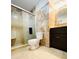 Updated bathroom with walk-in shower, modern fixtures, and stylish tile work at 345 Etheridge Rd, Auburn, GA 30011