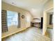 Bright bonus room featuring desk space and modern window treatments at 345 Etheridge Rd, Auburn, GA 30011
