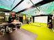 Entertainment Room with seating, bar and golf simulator at 345 Etheridge Rd, Auburn, GA 30011