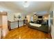Spacious living room with hardwood floors, modern decor, and abundant natural light at 345 Etheridge Rd, Auburn, GA 30011