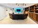 Cozy media room with custom built-ins, recessed lighting, and comfortable seating at 345 Etheridge Rd, Auburn, GA 30011