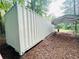 Shot of storage container with carport, located on wooded lot at 345 Etheridge Rd, Auburn, GA 30011