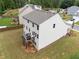 Aerial view of a spacious backyard with a wood deck, perfect for outdoor living at 520 Edgemore Rd, Canton, GA 30114