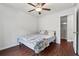 Comfortable bedroom featuring hardwood floors and a ceiling fan at 520 Edgemore Rd, Canton, GA 30114